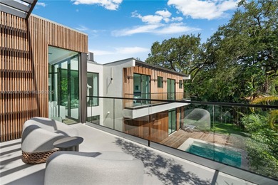 Welcome to CASA GRANDE, a dramatic 7BD/7BA modern residence