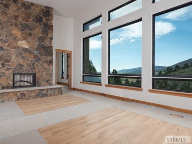 Perched atop a private knoll in Palisades Creek Ranch, this 2