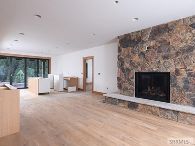 Perched atop a private knoll in Palisades Creek Ranch, this 2