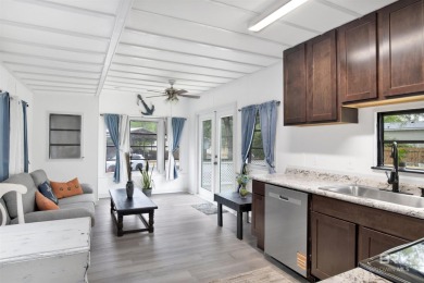 Nestled in the highly sought-after Spanish Cove subdivision