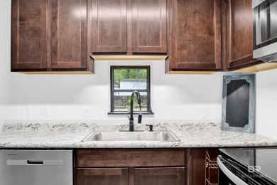 Nestled in the highly sought-after Spanish Cove subdivision