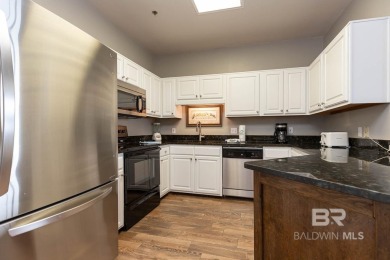 This rare 1st floor unit allows you to park directly in front of