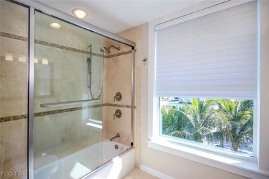 Step into a world of refined coastal living! A rare opportunity