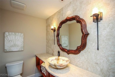 Step into a world of refined coastal living! A rare opportunity