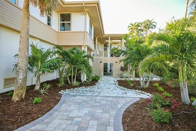 Step into a world of refined coastal living! A rare opportunity