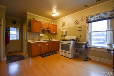 Welcome to this charming 4-bedroom, 1-bath home nestled in the