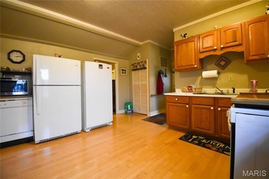 Welcome to this charming 4-bedroom, 1-bath home nestled in the