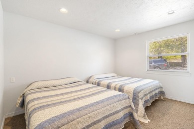 Welcome to Edgewater Villa--a summer-ready, turn-key furnished