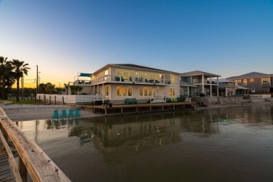 Tucked behind the gates of Sea Shell Shores, lies a home of