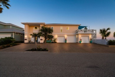 Tucked behind the gates of Sea Shell Shores, lies a home of