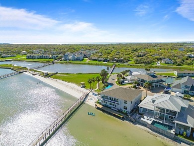 Tucked behind the gates of Sea Shell Shores, lies a home of