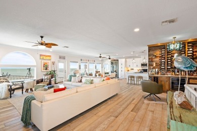 Tucked behind the gates of Sea Shell Shores, lies a home of