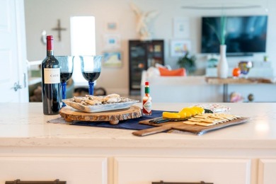 Tucked behind the gates of Sea Shell Shores, lies a home of