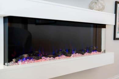 Tucked behind the gates of Sea Shell Shores, lies a home of