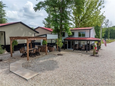 Just 10 minutes from the Bagnell Dam Strip-but tucked down a