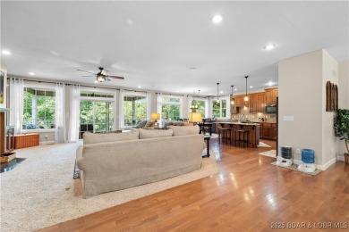 Immaculate home in a highly sought-after subdivision with lake