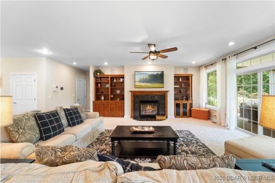 Immaculate home in a highly sought-after subdivision with lake