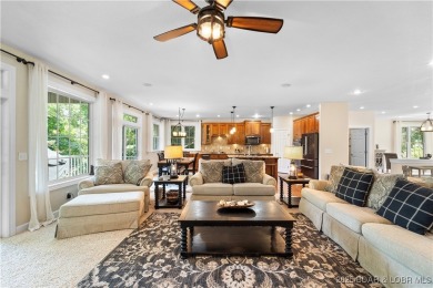 Immaculate home in a highly sought-after subdivision with lake