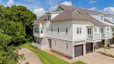 Welcome to refined coastal living in this exquisite end-unit