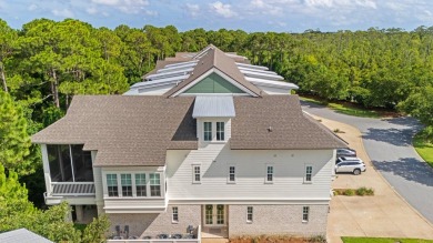 Welcome to refined coastal living in this exquisite end-unit