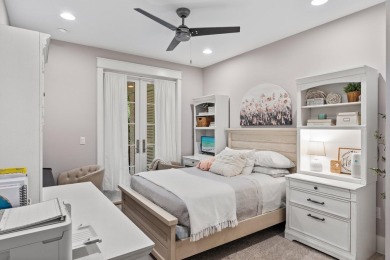 Welcome to refined coastal living in this exquisite end-unit