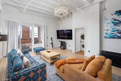 Welcome to this stunning high ceiling loft on the ninth floor of
