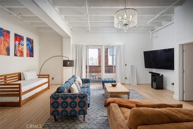 Welcome to this stunning high ceiling loft on the ninth floor of
