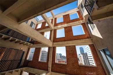 Welcome to this stunning high ceiling loft on the ninth floor of