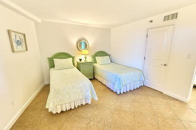 Beautiful beach views await you when you step into this lovely 2