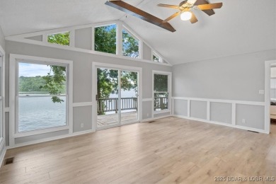 Don't miss this TURN-KEY lakefront home with spectacular lake