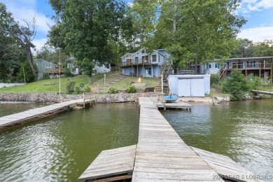 Don't miss this TURN-KEY lakefront home with spectacular lake