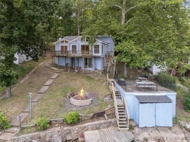 Don't miss this TURN-KEY lakefront home with spectacular lake