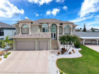 This amazing waterfront home is captivating from the moment you