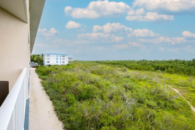 Professionally remodeled and fully furnished, this stunning unit