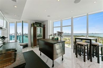 This trophy Penthouse comes with a 55' boat slip! Amazing