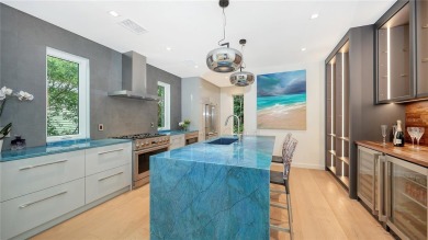 Discover unparalleled modern living at this custom contemporary