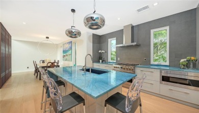 Discover unparalleled modern living at this custom contemporary