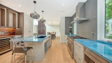 Discover unparalleled modern living at this custom contemporary