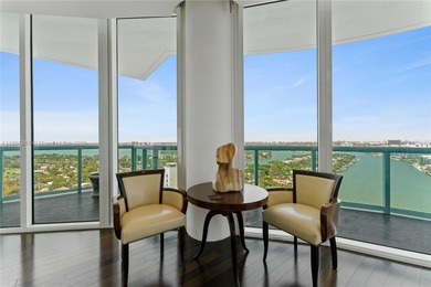 This trophy Penthouse comes with a 55' boat slip! Amazing