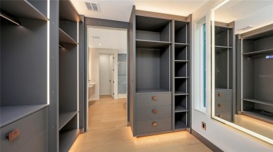 Discover unparalleled modern living at this custom contemporary