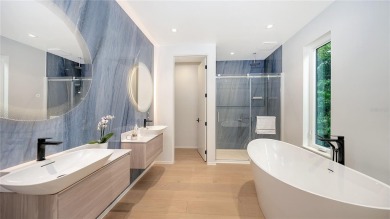 Discover unparalleled modern living at this custom contemporary