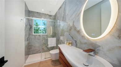 Discover unparalleled modern living at this custom contemporary