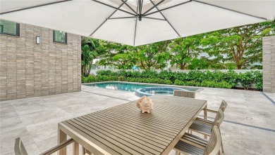 Discover unparalleled modern living at this custom contemporary