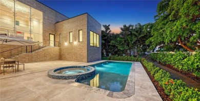 Discover unparalleled modern living at this custom contemporary