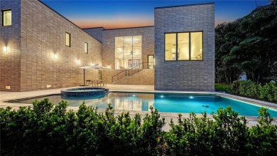 Discover unparalleled modern living at this custom contemporary