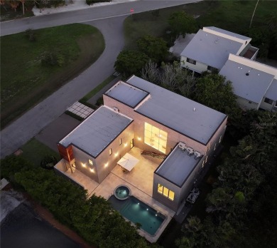 Discover unparalleled modern living at this custom contemporary