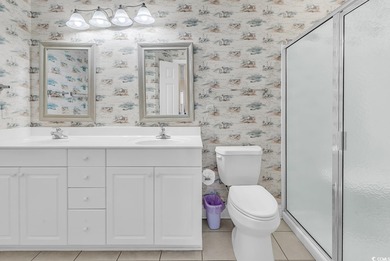 Welcome to this spacious and inviting three-bedroom, two-bath