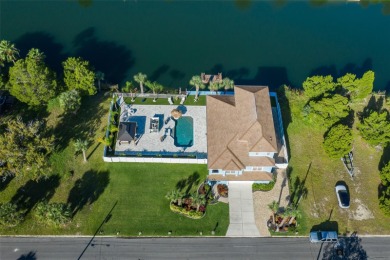 Welcome to the most gorgeous entertaining home in Hernando Beach