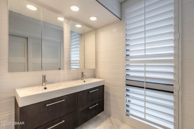 Experience elevated coastal living in this beautifully appointed