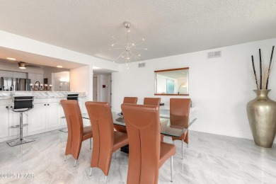 Experience elevated coastal living in this beautifully appointed